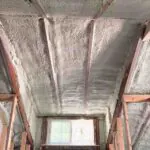 Toler Insulating closed cell spray foam applied to the underside of the roof deck between rafters during an attic renovation in Lynchburg, VA.